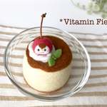 プリンに埋もれたさくらんぼちゃんピンクッション