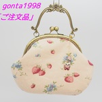 「chatoran7(nana)様のご注文品」気持ち華やぐがま口バッグ（大）（口金16.5センチ）（持ち手・お花）（苺柄・ピンク）