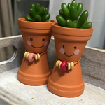 ふたごちゃんテラコッタ人形多肉付き