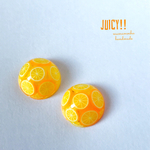 juicy！ミニチュア風みかんゼリーのドーム型ピアス