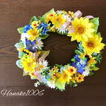 ひまわりの咲く花畑のリース