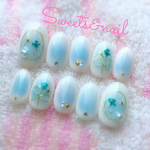 再販( *˘ ³˘)♡ワイヤーりぼん♡ふんわりチークの押し花ネイル  ブルー
