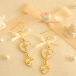 ハート＆アローとクロスのリボンピアス（white）