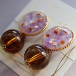 パープルとオレンジのまあるいイヤリング