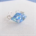 《光彩》のリング