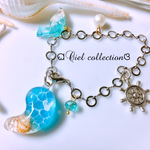 （minxya様オーダー品）勾玉に海月漂う水面模様 キーホルダー🐚