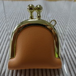 小さな皮革のジュエリーケース　クリームがかったオレンジ