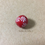 お花のついた真っ赤なとんぼ玉