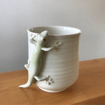 ヤモリのくっ付いたコップ