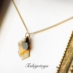 《特集掲載作品》Shiny diamond metal and tortoiseshell necklace