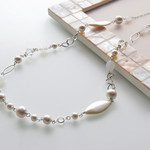 コットンパールとスワロフスキーのロングネックレス