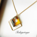 square tortoiseshell and metal long necklace