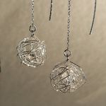 くるくるシルバーワイヤーのアメリカンピアス