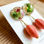 グリーン×ピンクピアス