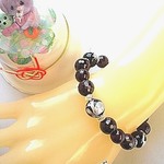 ガーネットと『最強守護石』・オニキス（青龍彫り・銀）の
