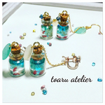 金魚の泳ぐ小瓶イヤリング