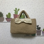 リボンの横長バッグ