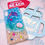 可愛いイルカと海のスマホケース