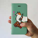 スマホケース　猫がすーん（ミント）