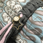 抱っこ紐収納ベルトバンド☓エルゴ☆ズパゲッティ☓タッセル☓ニコちゃん