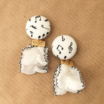 くるみボタンとリボンタッセルのピアス/イヤリング