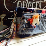 Denim clutch of a white horse