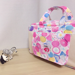3/10販売・おしりふきがさっと取り出せるおむつポーチ（メルヘン桃）