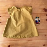 ブロードのプリーツ袖のワンピース