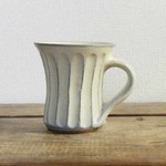 白いしのぎ手のマグカップ（蘭越） 