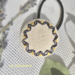 まるい模様の刺繍ヘアゴム(紺・黄色)