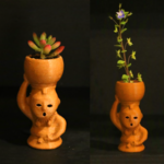 埴輪一輪挿し（水瓶で植物を育てる女性）