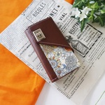 Orangeボタニカルフラワー◆iPhoneケース◆花柄手帳型スマホケース