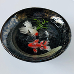 小皿に金魚