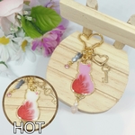 色が変わる♡ローズクォーツ付き苺猫のバッグチャーム