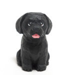 コルクの黒ラブ子犬