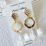 gold parts × clear