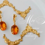 ヴィンテージビジューのイヤリング topaz o