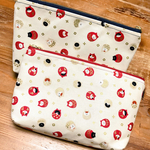 ダルマねこ柄ファスナーポーチ[アイボリー×ピンク]