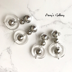 silver × clear circle
