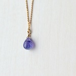 14kgf　‘ハイグレードなタンザナイト　‘　9.5×6mm　J