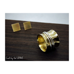 Spinning gold and silver rings