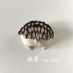 つまみ細工のハリケツブローチ(足閉じVer.)