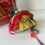 あみくるみがま口 半円パールの変わりげんこ 赤とGIMAとギラギラと