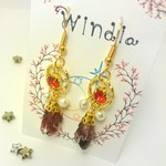 魔法使いの赤い鉱石ピアス