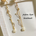 ツイスト✾パールのピアス イヤリング
