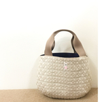 ブルメリア 刺繍 丸みバッグ ベージュ アップリケ付き
