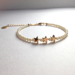 ✴︎新作✴︎華奢で可愛い✨パールと三つ星ブレスレット⭐️ニコちゃん付☺︎