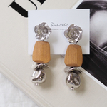 silver flower × wood earring