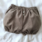 コーデュロイのボタンつきかぼちゃパンツ