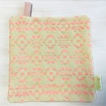 桜染めの糸で刺したこぎん刺しのポットマット  colorfulーからふるー【梅の花×ウロコ形】《樫の木  produce by プリザ工房*Merrymei*》